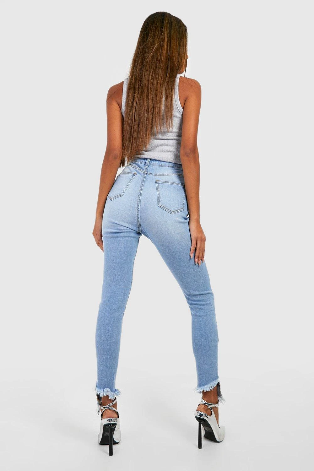 Zerrissene Skinny Jeans Mit Asymmetrischem Saum 2 Zerrissene Skinny Jeans Mit Asymmetrischem Saum – Bild 2