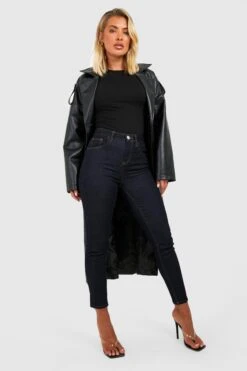 Indigoblaue Skinny Jeans Mit Mittelhohem Bund